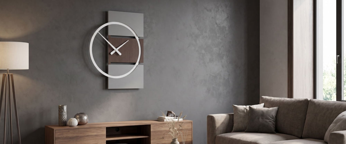 CalleaDesign designer wall clock in a contemporary living room with grey walls and warm wood furniture