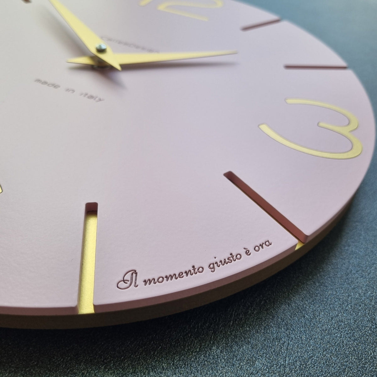 Personalised CalleaDesign wall clock with an engraved dedication