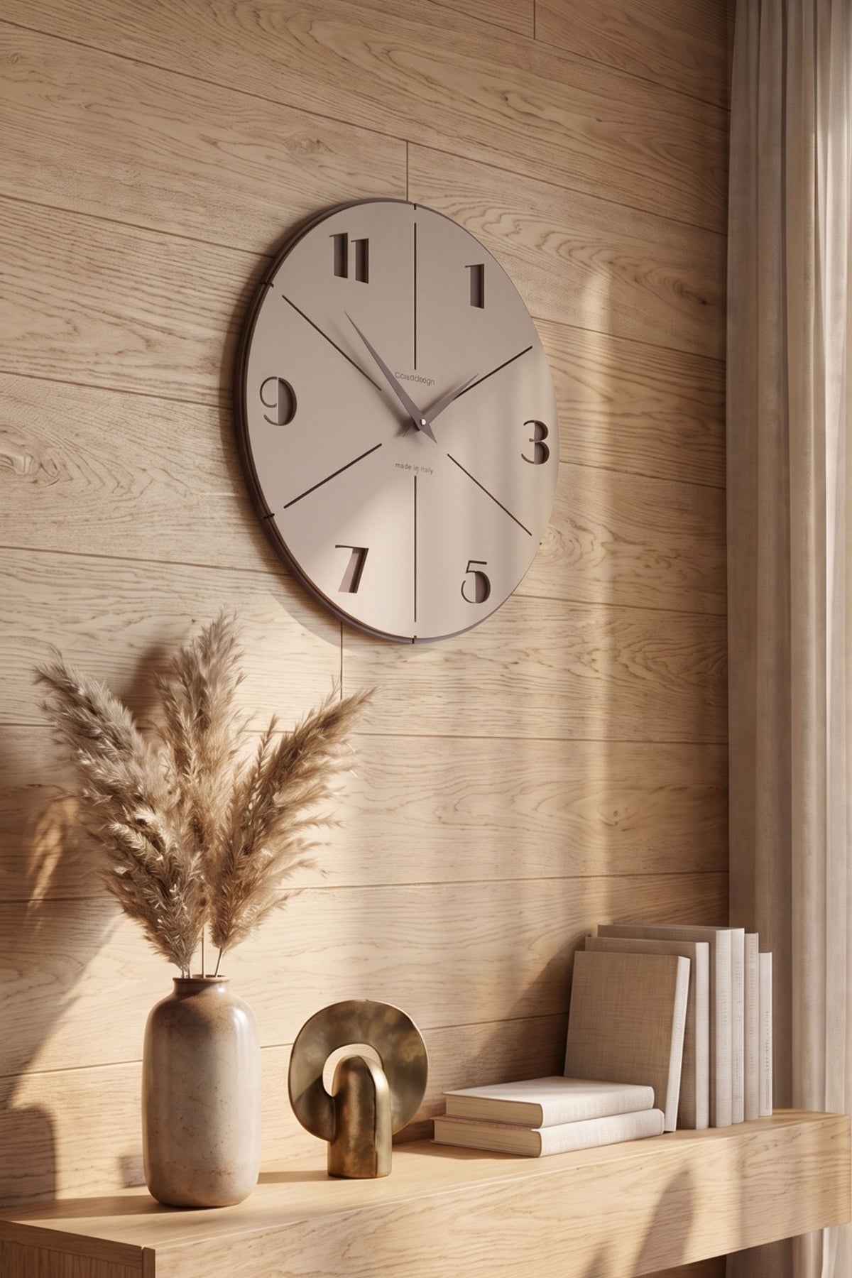 CalleaDesign Aurelio wall clock in Café Latte finish on a warm wood wall in a contemporary interior