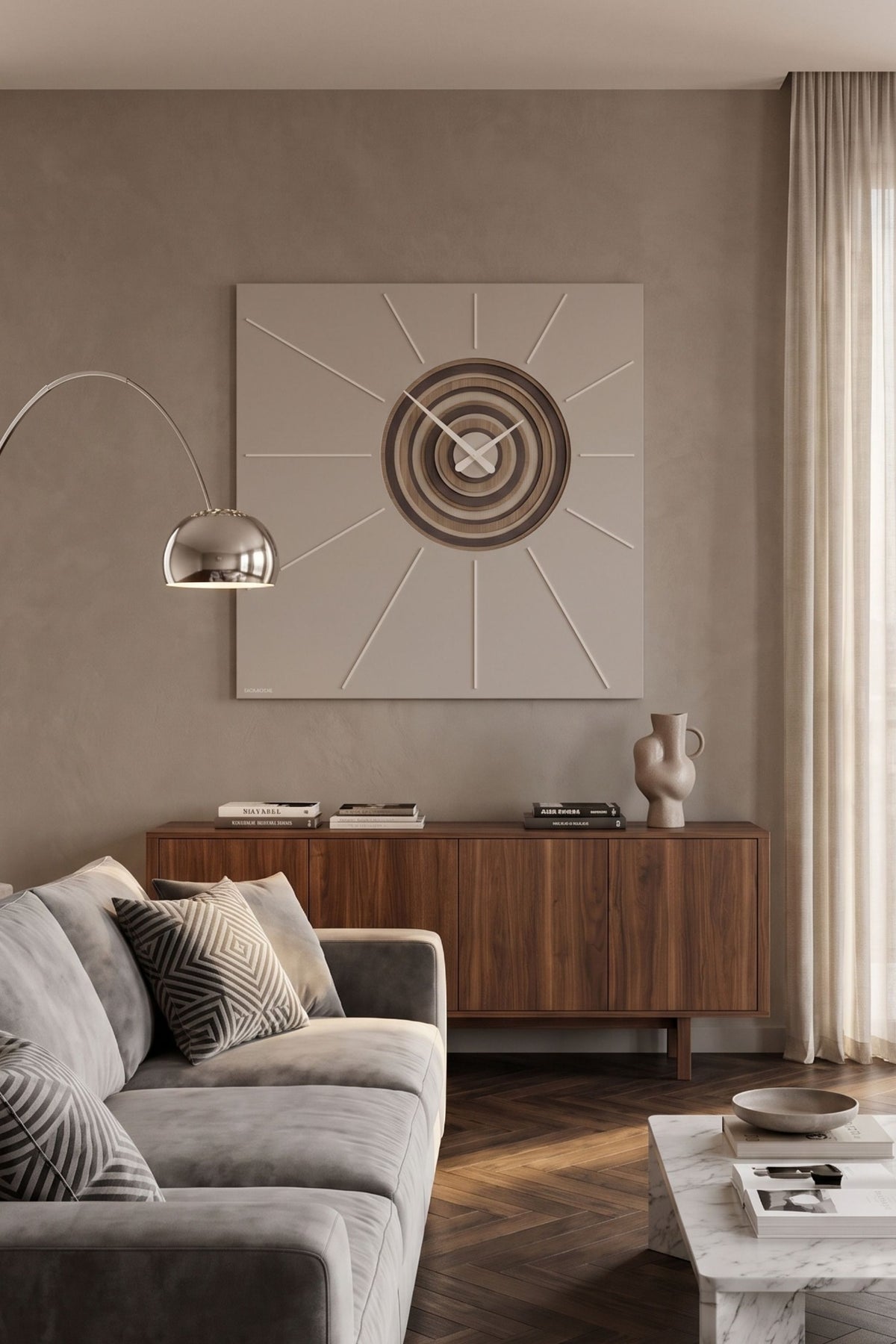 CalleaDesign Helios wall clock in Sand finish displayed in a contemporary living room