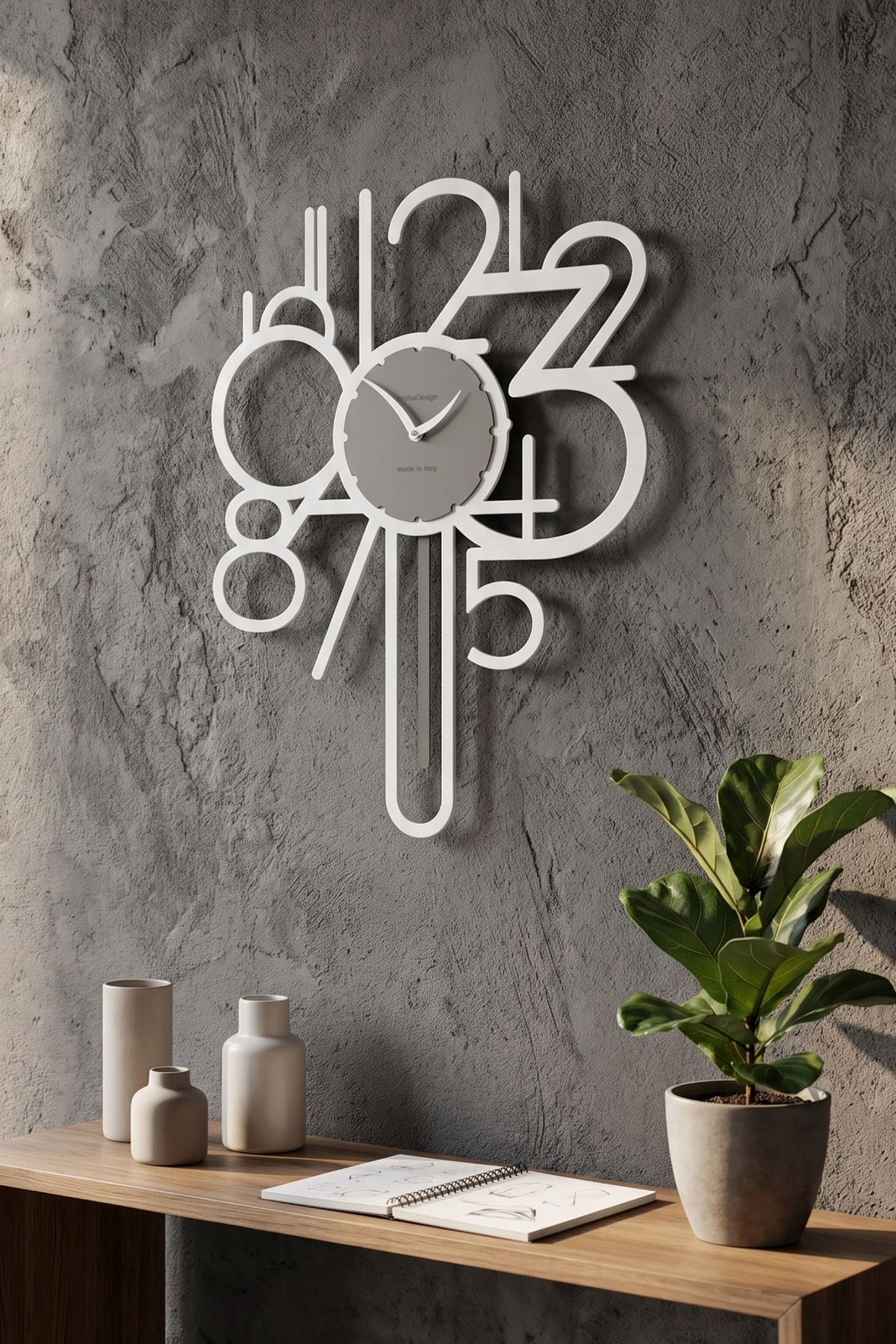 CalleaDesign Joseph pendulum clock in White finish in a modern interior