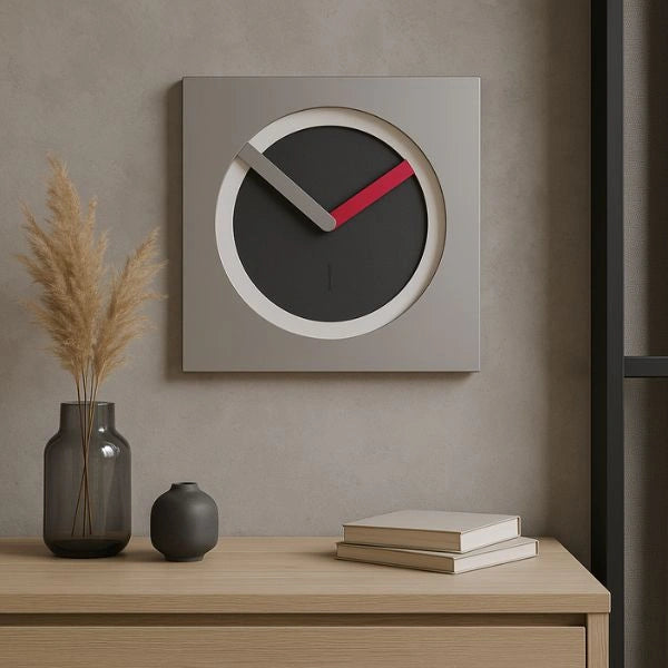KAM Bloom wall clock above a light wooden sideboard in a warm contemporary interior