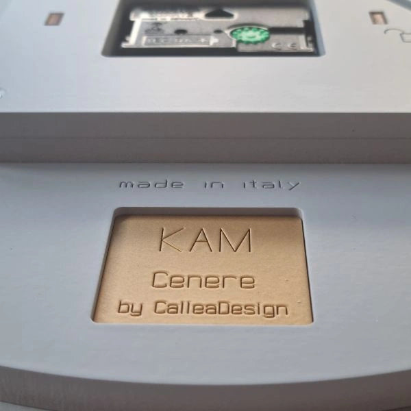 Engraved KAM Cenere by CalleaDesign signature and Made in Italy detail on the back of the clock