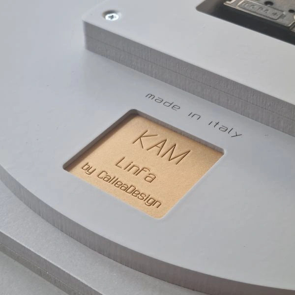 Engraved KAM Linfa by CalleaDesign name and Made in Italy detail on the back of the wall clock