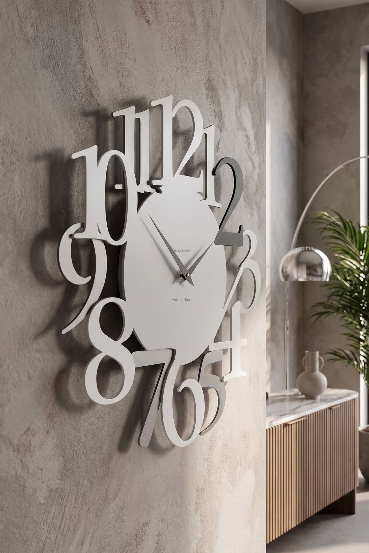 CalleaDesign Russell wall clock in a contemporary interior